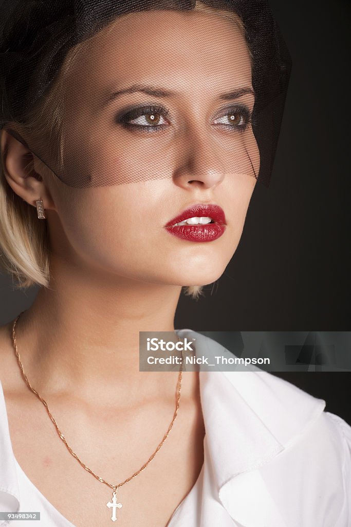 Portrait of retro-style woman in white blouse and black veil  1930-1939 Stock Photo