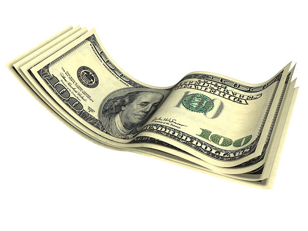 Isolé sur une image blanche de plusieurs billets en dollars américains - Photo