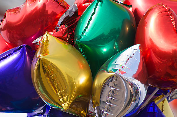 bunch balloons  helium balloon stock pictures, royalty-free photos & images