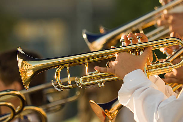 istock gold trombones on the concert 93500092