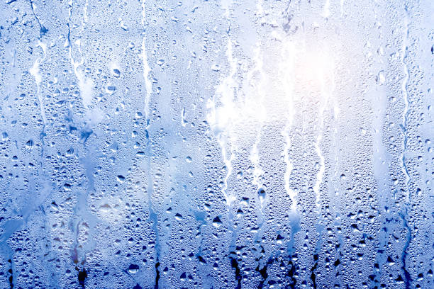 texture background wet drops of water dew on misted glass