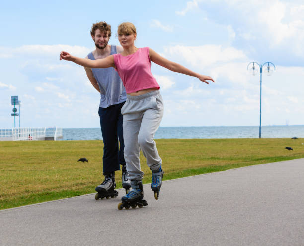 istock roller skater couple skating outdoor 935012462