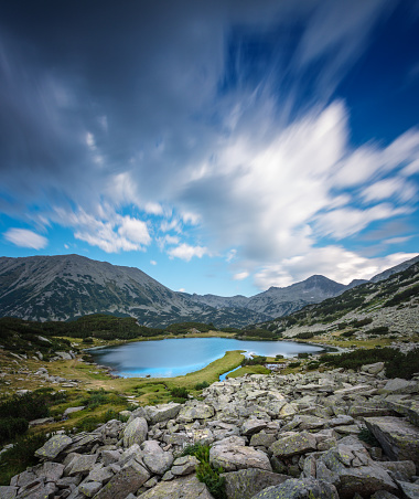 Tatra rosky mountain peaks with tourist hiking trails in sunny summer day. Slovakia