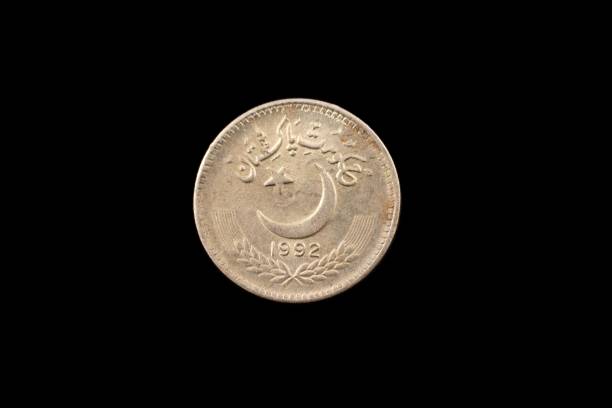 istock Old Pakistani Twenty Five Rupee Coin Isolated On Black 935034836