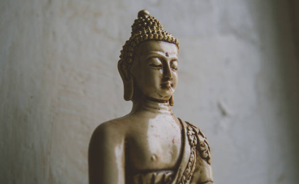istock a symbol of Buddhism. Buddha statue 935035318