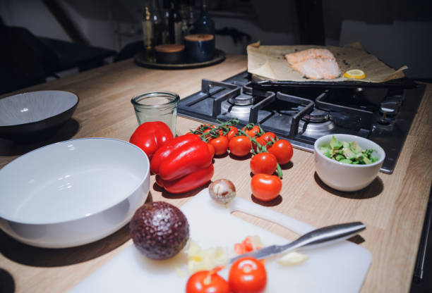 istock Different vegetables on kitchen's desk with cute avocado 935052314