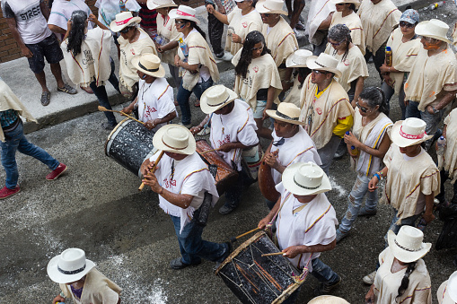 Popayán, Colombia - January 5 2014 : View from above of traditional Colombian band marching in the Carnival de Negros y Blancos procession.