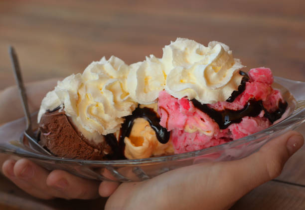istock ice cream balls with chocolate and cream served in vase 935055520