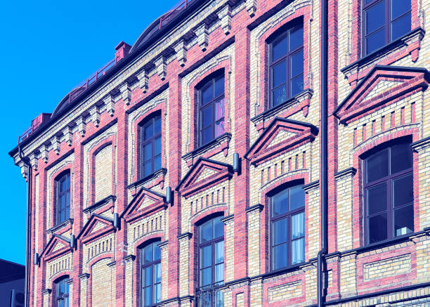 istock Fragment of brick apartment building toned 935069068