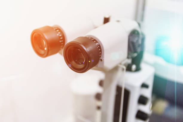 istock Ophthalmology eyesight diagnostic concept. Modern eye test machine equipment in clinic 935072306