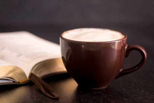 istock Coffee and a Bible on a Slate Tabletop 935075080