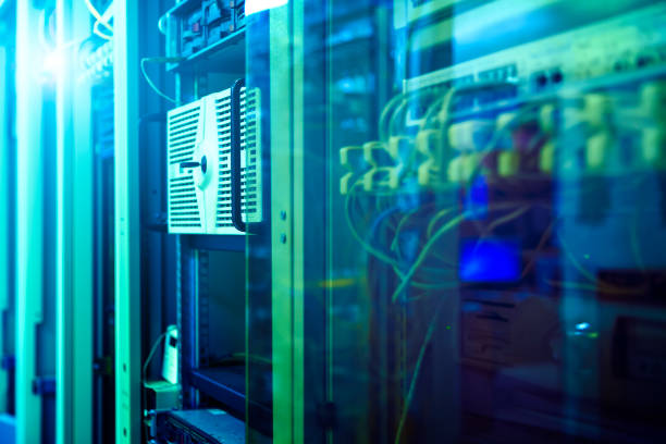 istock label of fiber optic cable and high speed network router switch in a technology data center room . blur background 935075278