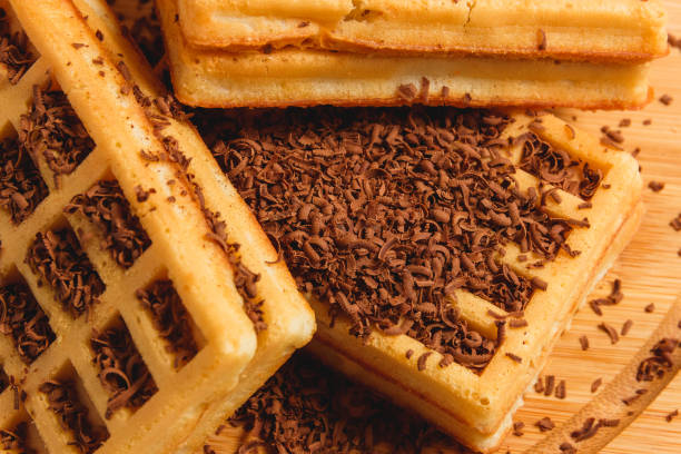 istock Homemade Waffles with Jam and Chocolate Shavings Background. 935078204