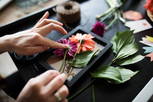 istock My handmade.Pressed flowers in glass frames 935078400