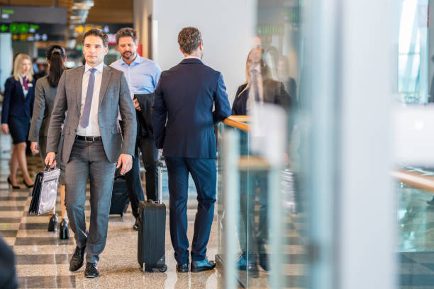 istock People at an airport terminal 935088350
