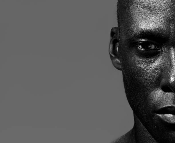 istock Half face handsome african american man staring 935110496