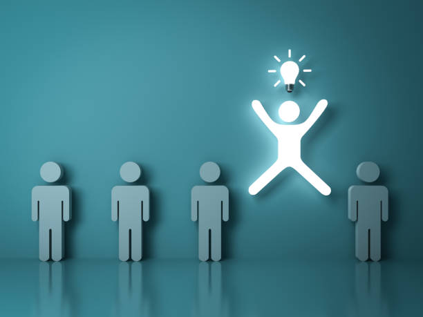 istock Stand out from the crowd and different concept , One glowing light man jumping with an idea bulb among other people on dark green pastel color background with reflections 935128292