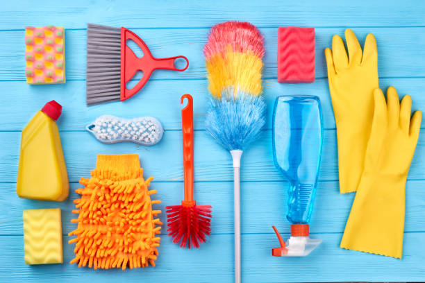 Cleaning Stuff On Blue Wooden Background Stock Photo - Download Image Now -  Blue, Bottle, Broom - iStock