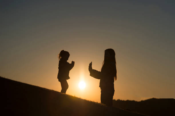Mother and daughter silhouette