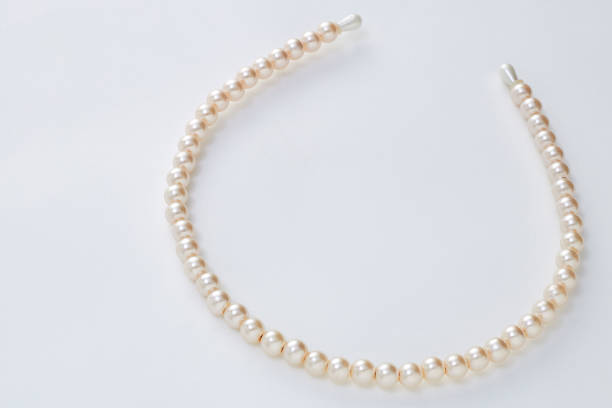 istock Head band with big white pearls isolated on white background 935151070