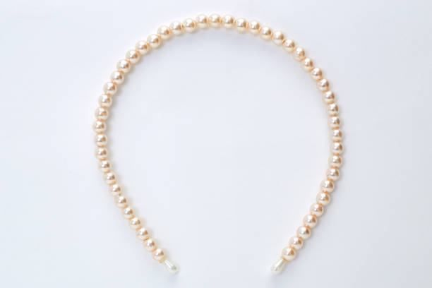 istock Head band with big white pearls isolated on white background 935151090