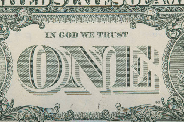 istock Close up of one dollar isolate on white background 935153392