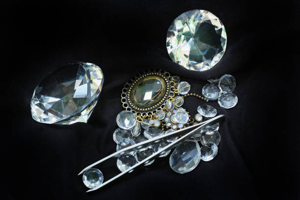 istock Sparkling diamond pile tweezers 935167758