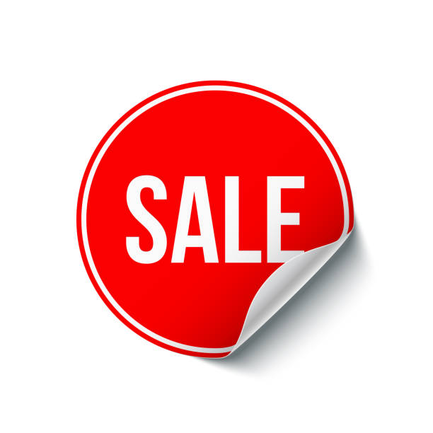 istock White Sale word on round red sticker with curled edge isolated on white background. Vector design element. 935167922