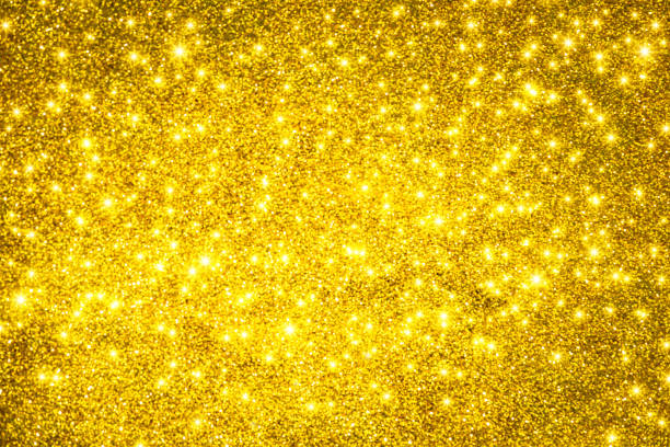 istock golden glitter texture Colorfull Blurred abstract background for birthday, anniversary, wedding, new year eve or Christmas 935167988