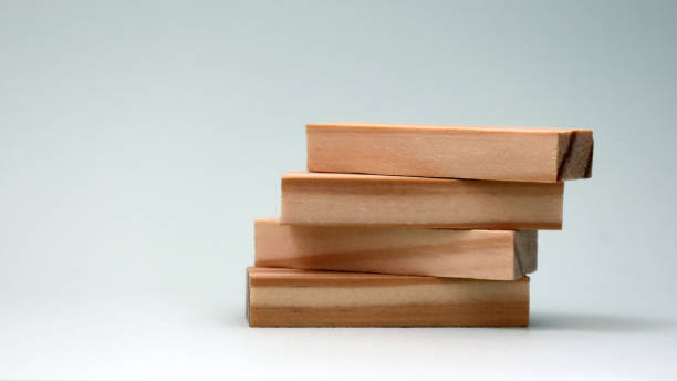 istock A pile of four wooden blocks. 935172346