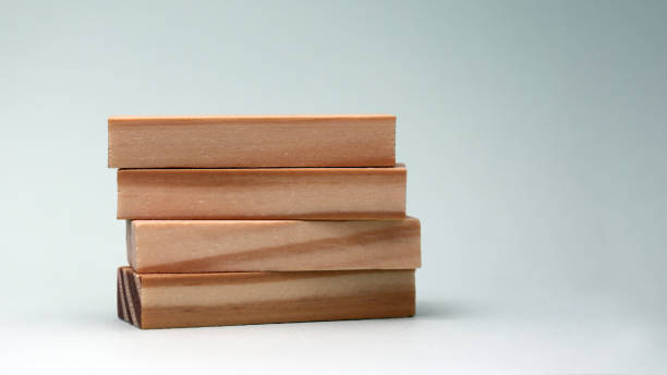 istock A pile of four wooden blocks. 935173488