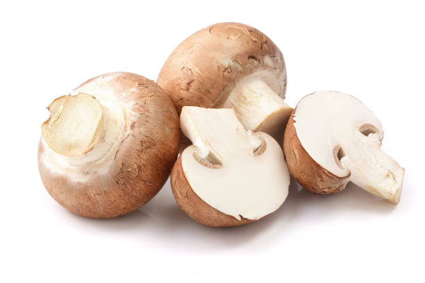 istock Royal Brown champignon with half isolated on white background 935217876