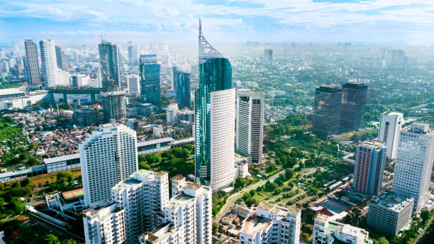 Aerial photo of iconic BNI 46 Tower Jakarta Indonesia JAKARTA - Indonesia. March 12, 2018: Aerial photo of iconic BNI 46 Tower with located in South Jakarta Central Business District, indonesia stock pictures, royalty-free photos & images