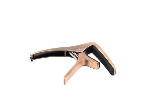 istock Metal Guitar Capo isolated on white background 935223406