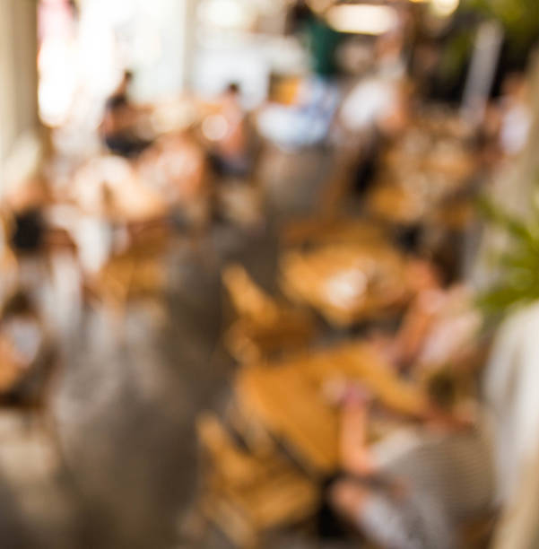 istock Blurred background of coworking place in coffee cafe 935223872