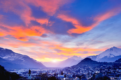 Cityscape and Swiss Alps at Dramatic Sky, Sion, Switzerland