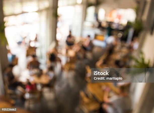 Blurred Background Of Coworking Place In Coffee Cafe Stock Photo - Download Image Now