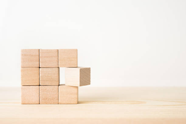 istock wooden cube with leadership, teamwork and different concepts 935228848