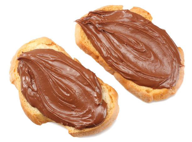 istock Slice of bread with chocolate cream isolated on white background 935237974