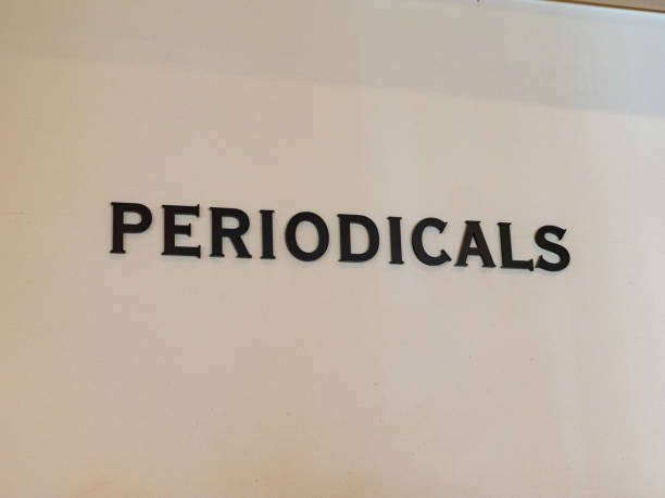 istock Library periodicals sign against white wall 935241188