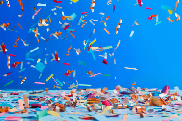 istock birthday confetti on blue background 935241872