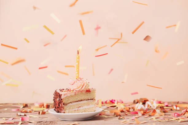 istock piece of cake on a wooden table 935241876