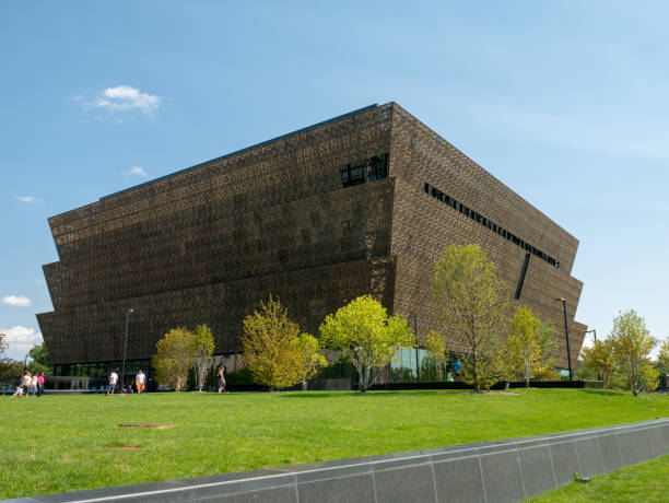Smithsonian National Museum of African American History and Culture completed outdoor view WASHINGTON, DC – AUGUST 19, 2017: An ourdoor view of the Smithsonian National Museum of African American History and Culture (NMAAHC), completed and in its first year of business. smithsonian museums stock pictures, royalty-free photos & images
