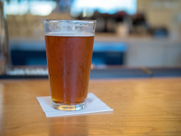 istock Beer sitting on a table on a bar counter 935245084
