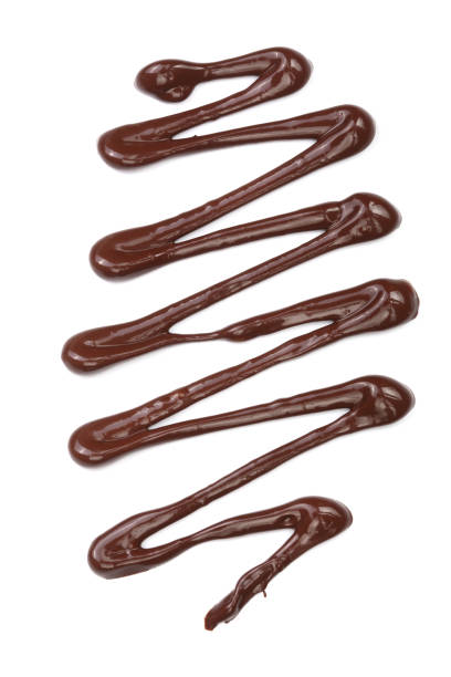 istock sweet chocolate sauce isolated on a white background 935251254