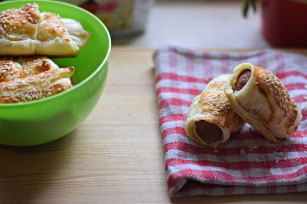 istock Delicious homemade sausage rolls whit sesame pastry 935253874