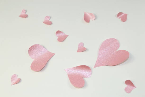 istock Many pastel rose paper hearts 935253906