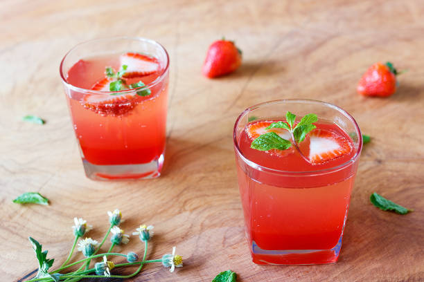 istock Summer strawberry drink on wooden table. 935254670