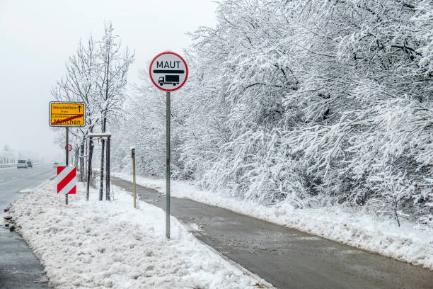 istock Real Maut sign for lorrys in the snow 935261802