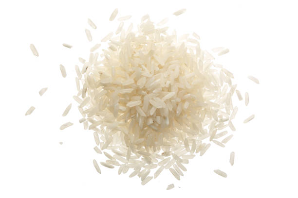 istock rice grains isolated on white background. Top view. Flat lay 935262156